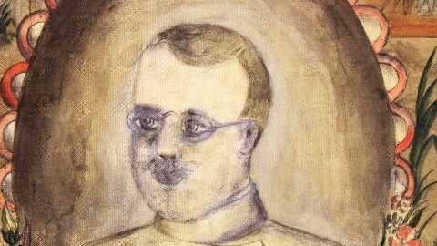 Selbstgemaltes Porträt von Mathäus Lorenz Seitz 1921. Das Bild zeigt einen Mann mit Brille, hellem Haar, hoher Stirn und Schnauzbart. Er schaut leicht nach links und trägt eine Uniform. Das Bild ist mit einem rot verzierten Oval umrandet.